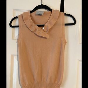 Barney's sleeveless 100% cashmere sweater.